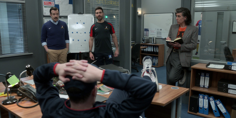 New Balance Sneakers of Brendan Hunt as Coach Beard and Nike Tops Worn by Jason Sudeikis & Brett Goldstein in Ted Lasso S03E03 “4-5-1” (2023)